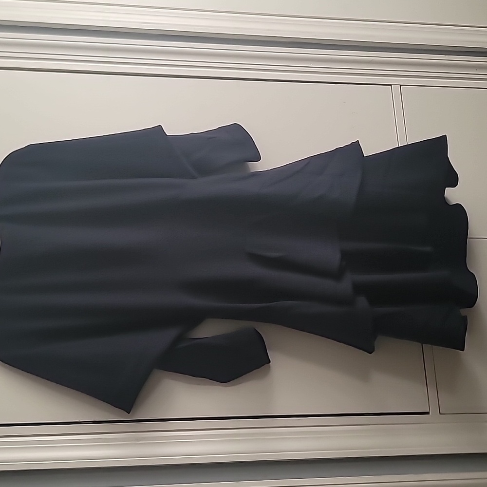 Navy wool waisted party dress. Open back.  Brand is Cosette